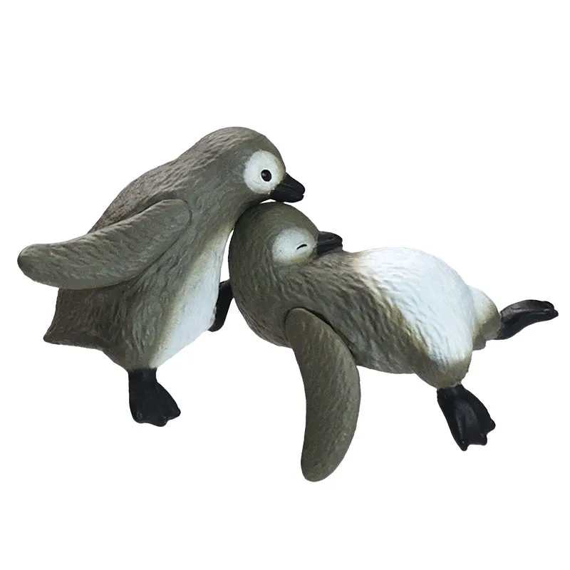 X 70963 Playful Penguin Figurine Capsule-DISCONTINUED